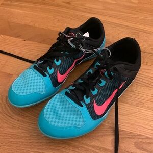 Teal and pink NIKE Rival MD racing shoes- multi use. Brand new, never worn.
